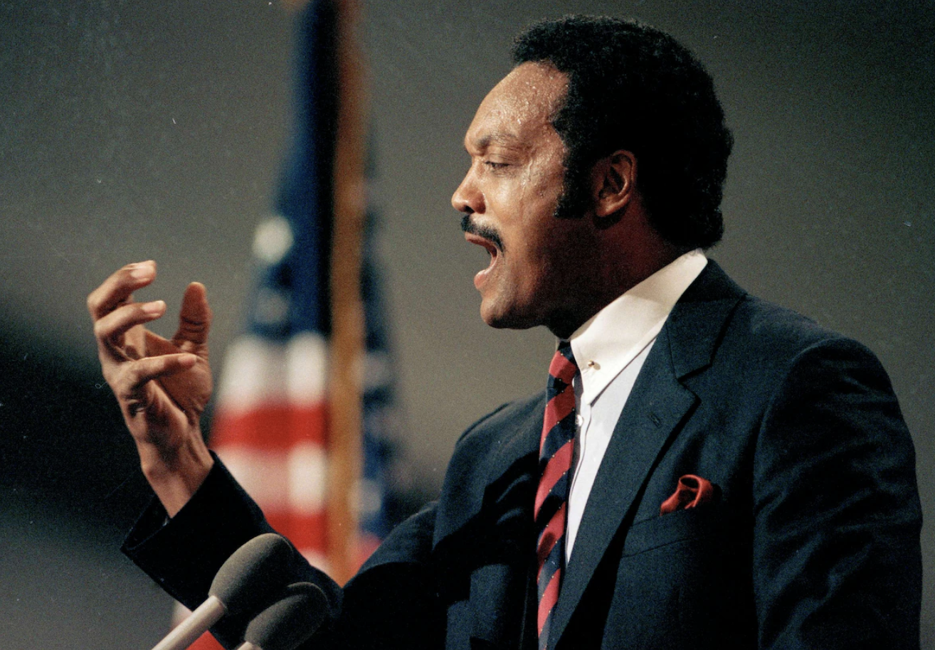 Rev. Jesse Jackson gives his famed “Rainbow Coalition” speech at the Democratic National Convention in San Francisco.  "Our flag is red, white and blue, but our nation is a rainbow—red, yellow, brown, black and white—and we’re all precious in God’s sight," he said during the now-iconic address.